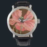 Montre Grande Fleur rose avec Arrière - plan rouge profon<br><div class="desc">Une grande fleur rose repose sur un arrière - plan rouge profond dans ce tableau de Nancy Slocum. La fleur est vibrante et en pleine floraison. Un cadeau étonnant pour une personne spéciale dans votre vie!</div>