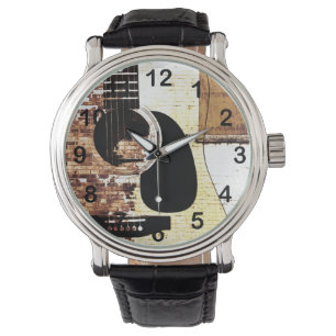 Montre guitare acoustique sur l'arrière - plan de brique