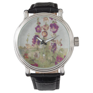 Montre Hollyhocks au bord de la mer