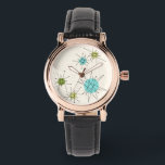 Montre Iconique Starbursts Regarder en cuir atomique<br><div class="desc">Ce motif de surveillance en cuir étoile atomique conique présente des étoiles atomiques emblématiques. C'est vrai ! L'ancienne école, arrière - plan crème avec des taches d'or est la toile de fond parfaite pour le céleri turquoise, apaisant, et les cercles kitsch vert poire. Les taches de couleur sont sporadiquement placées...</div>