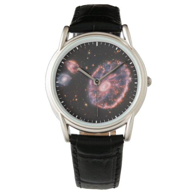 Montre La Galaxie Cartwheel Et Ses Galaxies Compagnons. (devant)