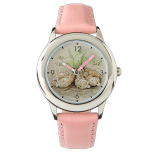 Montre Les lapins de Flopsy endormis (par Beatrix Potter)