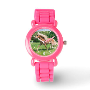 Montre Les poulains mignons de chevaux de Haflinger
