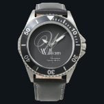 Montre Masculin Noir Visage Gris Blanc Monogramme Garçon<br><div class="desc">Offrez à vos garçons d'honneur un morceau d'élégance robuste avec cette montre classique à face noire. Caractérisée par un monogramme gris audacieux et une police blanche nette pour les noms et les dates, cette montre est conçue pour l'homme moderne qui apprécie une esthétique masculine et robuste. C'est un souvenir fonctionnel...</div>