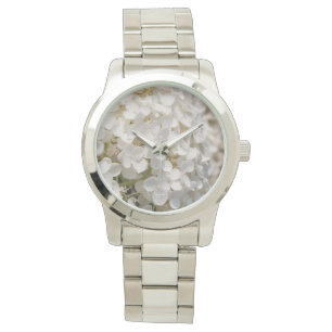 Montre montre, fleur blanche