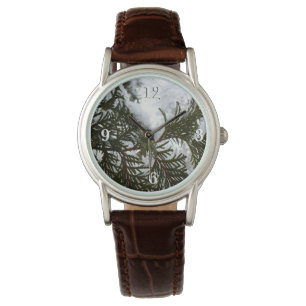 Montre Neige sur les branches À feuillage persistant