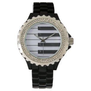 Montre noire et blanche de clés de piano