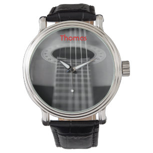 Montre noire et blanche de guitare