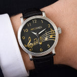 Montre Nom des notes de musique en or noir<br><div class="desc">Simple et élégant pour un mélomane ou un musicien ! Arrière - plan noir avec des notes de musique faux or. Modèle pour ton nom, lettres d'or. Numéros d'horloge dorés.</div>