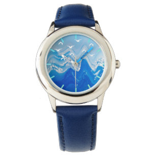 Montre Oiseaux au-dessus des vagues de la mer