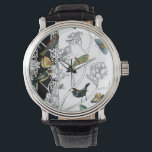 Montre Oiseaux et papillons sur un Arrière - plan noir et<br><div class="desc">L'artiste Chariklia Zarris est un peintre et designer talentueux. Elle aime peindre des oiseaux et des animaux sauvages et cette photo ne fait pas exception. Les couleurs vives des oiseaux et des papillons sont accentuées par les branches noires et blanches de l'arrière - plan.</div>