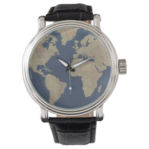Montre Or et carte bleue du monde