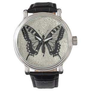 Montre Papillon noir et blanc sur l'arrière - plan criqué