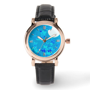 Montre Papillons contre ciel bleu nuit, paysage lunaire