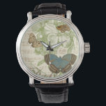 Montre Papillons sur Partition avec Design Floral<br><div class="desc">Un design floral vert et de la partition font arrière - plan à un trio de papillons dans cette pièce de Vision Studio. Le mot français papillon est également emblaqué au fond de la pièce. Si vous aimez les papillons, la nature, ou tout comme vous entourer de beauté, c'est l'impression...</div>