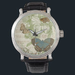 Montre Papillons sur Partition avec Design Floral<br><div class="desc">Un design floral vert et de la partition font arrière - plan à un trio de papillons dans cette pièce de Vision Studio. Le mot français papillon est également emblaqué au fond de la pièce. Si vous aimez les papillons, la nature, ou tout comme vous entourer de beauté, c'est l'impression...</div>