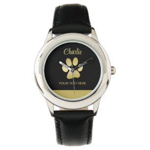 Montre Paw chien brillant or sur arrière - plan noir