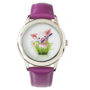 Montre Petit porc rose dans l'herbe verte