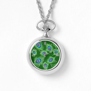 Montre Plumes de chaux et de paon bleu sur vert émeraude
