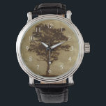 Montre Silhouette d'arbre sur Arrière - plan de bronze<br><div class="desc">Un arrière - plan de bronze sert de scène à cette silhouette d'arbre avec des branches qui se balancent dans la brise. On a presque l'impression de se reposer le dos contre cet arbre,  de s'asseoir à terre et de faire une longue sieste.</div>
