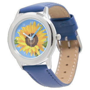 Montre Tournesol jaune contre soleil sur ciel bleu - été