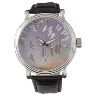 Montre Troupeau d'ibis volant au-dessus des zones humides