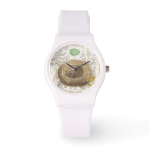 Montre Un nid d'oiseaux avec un oeuf vert