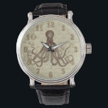 Montre Vintage Brown Octopus<br><div class="desc">Ce magnifique dessin de pieuvre antique* du 19ème siècle a été recoloré brun et placé sur un joli arrière - plan marron clair - beige défoncé / grunge avec un motif d'ancre faible. Le résultat est une montre originale qui correspond à votre thème nautique et de plage ou à la...</div>