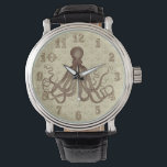 Montre Vintage Brown Octopus<br><div class="desc">Ce magnifique dessin de pieuvre antique* du 19ème siècle a été recoloré brun et placé sur un joli arrière - plan marron clair - beige défoncé / grunge avec un motif d'ancre faible. Le résultat est une montre originale qui correspond à votre thème nautique et de plage ou à la...</div>