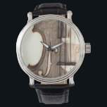 Montre Violon, Viola, Cello ?<br><div class="desc">Une image artistique d'un instrument à cordes.</div>