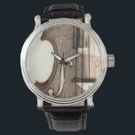 Montre Violon, Viola, Cello ?<br><div class="desc">Une image artistique d'un instrument à cordes.</div>