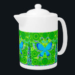 Mosaïque turquoise verte de cercles concentriques<br><div class="desc">Mosaïque turquoise verte de cercles concentriques de papillon.  Un amusement et un motif coloré des cercles concentriques et du pois avec un papillon conçoivent au milieu.   

 couleur" "unique" "lumineuse" "colorée" "girly" de "motif" de "pois" de "amusement" de "sarcelle d'hiver" de "mosaïque" de "papillons" de "papillon" ""lumineuse"</div>