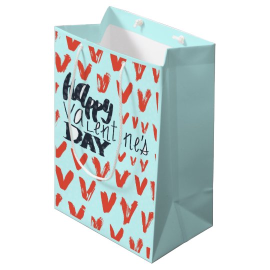Motif bleu-clair de coeurs de heureuse sac cadeau moyen