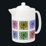 Motif d'art floral aux fleurs colorées<br><div class="desc">Style pop art Gerbera motif en fleurs aux couleurs pastel sur théière.</div>