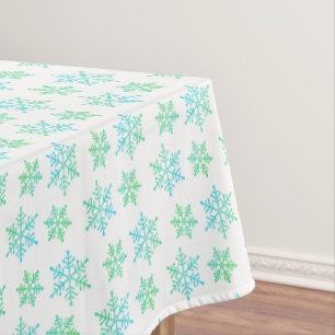 Motif de flocon de neige turquoise sur nappe blanc