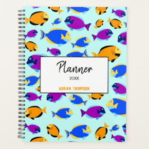 Motif de poissons tropicaux colorés en Mer Bleue