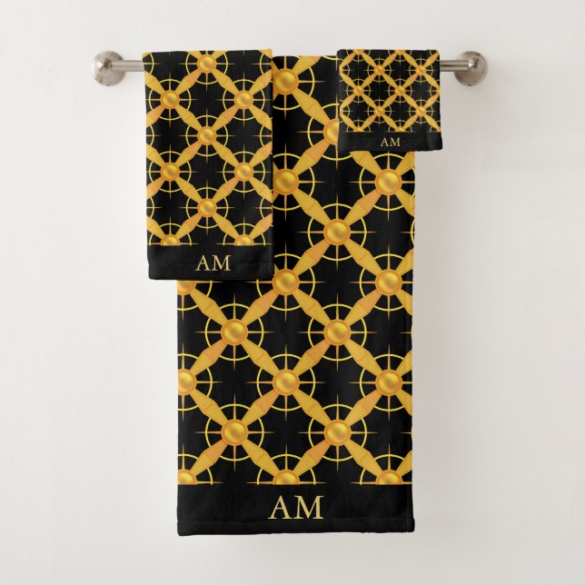 Motif doré élégant et monogramme sur fond noir (En situation)