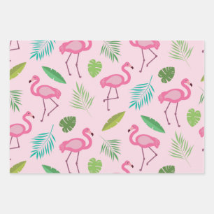 Motif flamant rose avec feuilles tropicales