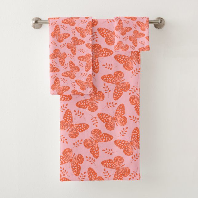 Motif papillon orange sur arrière - plan rose (En situation)