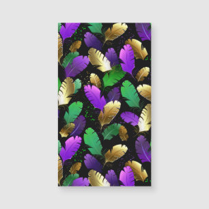Motif sans couture avec des plumes de Mardi Gras