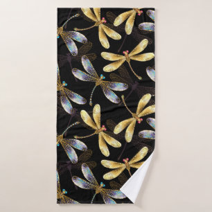 Motif sans couture avec libellules d'or