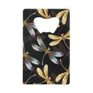 Motif sans couture avec libellules d'or