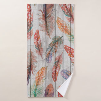 Motif sans couture modèle avec plumes de couleur. 