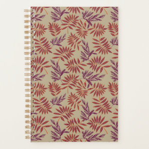 Motifs de feuilles rouges et violettes vives sur f
