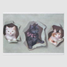 Chatons vintage faisant irruption dans du papier c