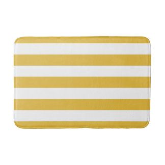 Moutarde et tapis de bain rayé blanc
