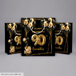 Moyen Glam Gold High Heels 90th Birthday Cadeau sac<br><div class="desc">Célébrez avec style ce sac cadeau d'anniversaire personnalisé avec ballons noirs et or, talons hauts en or, et confettis de parties scintillant étincelante. Parfait pour les fêtes d'anniversaire, ce sac cadeau chic ajoute du glamour et de l'élégance à toute célébration. Customisez-le avec un nom ou un message spécial pour rendre...</div>