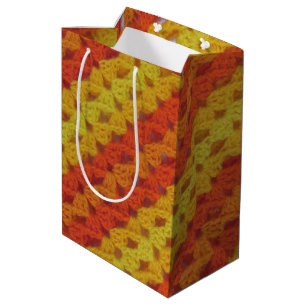 Moyen Motif diagonal jaune et orange de sac de cadeau -