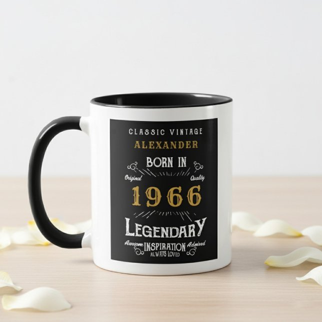 Mug 60th Birthday 1966 Legend Retro Black Personalized (born 1966 birthday mug. Background is wood table, white wall and flower petals.)