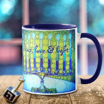 Mug Blue Green Hanoukka Menorah Peace Love Light Citat<br><div class="desc">"Paix, amour et lumière." Une photo de fond illustrant une menorah d'art bleu et vert brillant, coloré, vous aide à inaugurer les vacances d'Hanoukka dans le style. Sentez la chaleur et la joie de la saison des Fêtes chaque fois que vous buvez dans cette magnifique tasse de café Hanoukka colorée....</div>